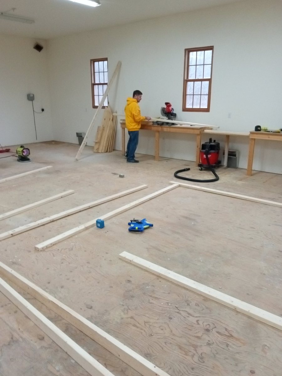 Large interior work area during repair and finish preparation.